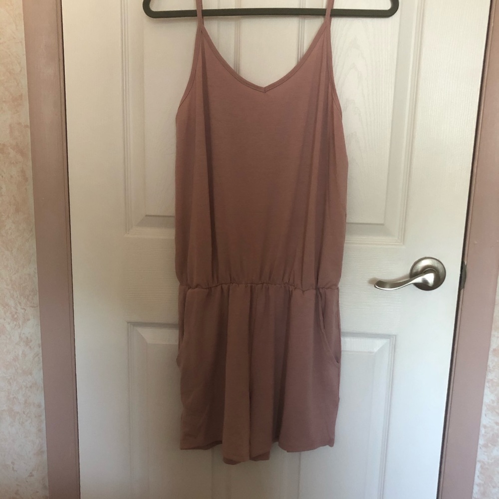 Pale pink romper with pockets